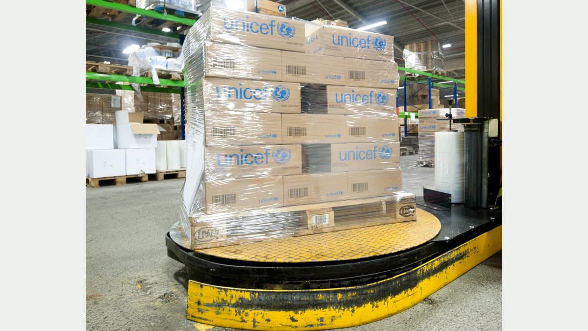 Cartons on a pallet at a stretch-wrapping turntable